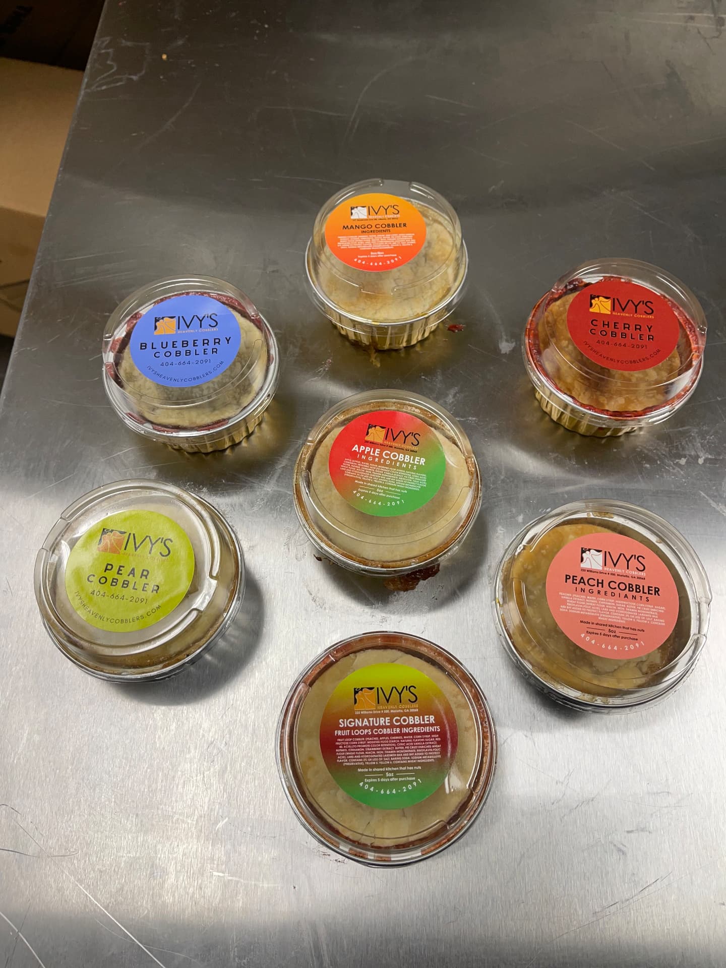 Seven Ivy's cobbler cups — blueberry, mango, cherry, apple, pear, peach and signature fruit loops
