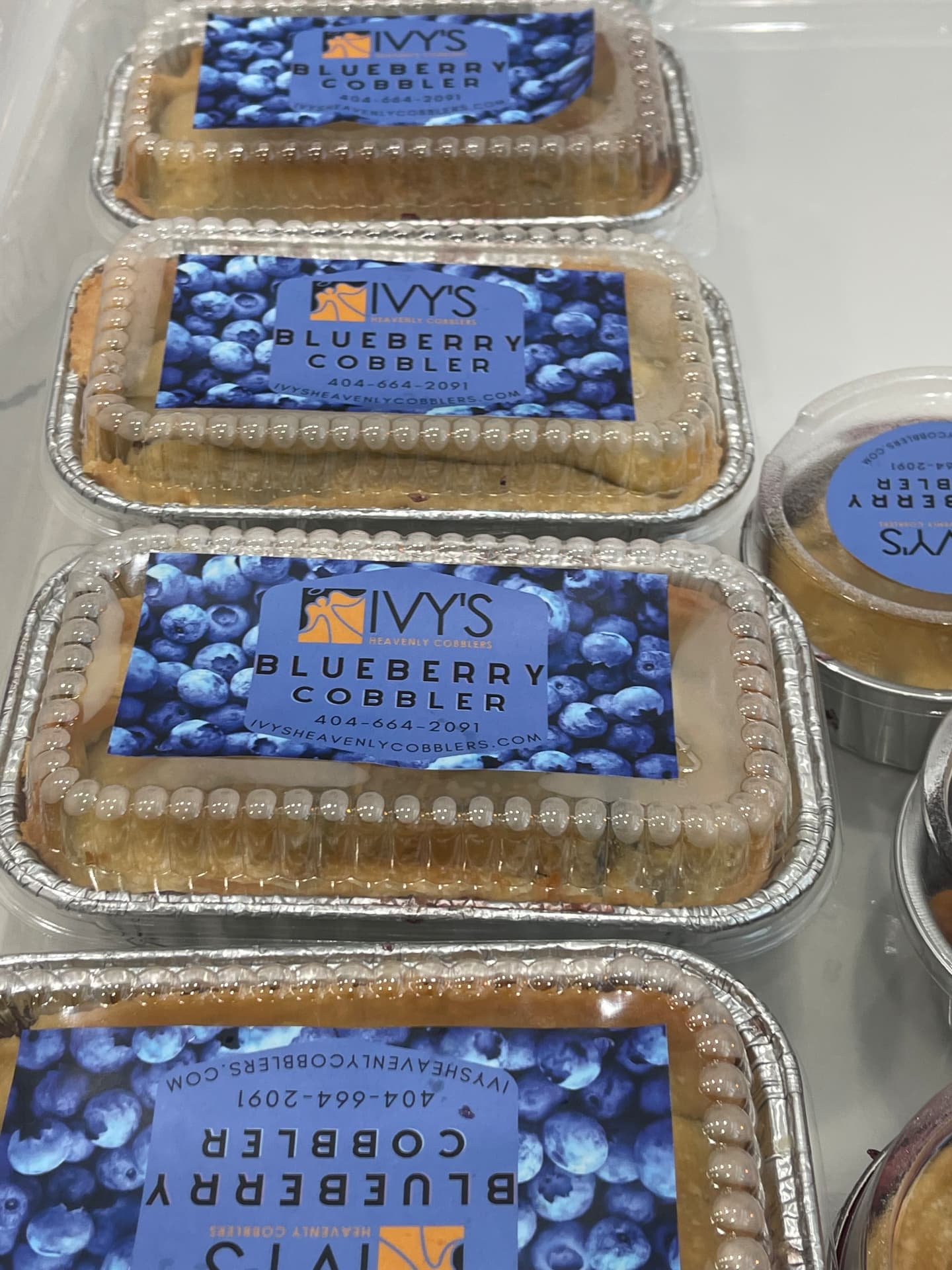 Labeled Ivy's blueberry cobbler loaf pans